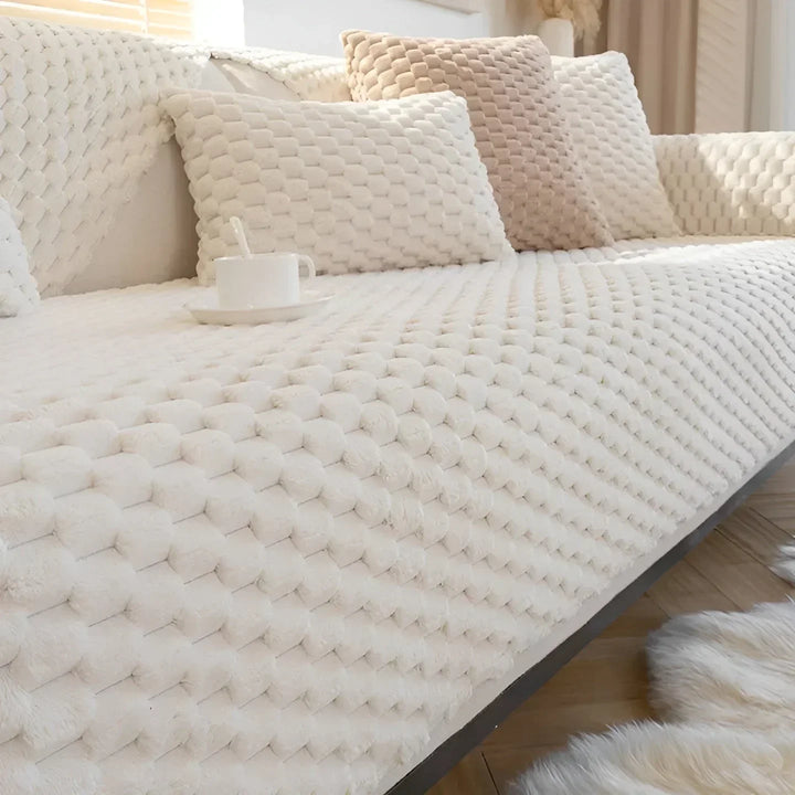 Luxurious velvet sofa cover with textured pattern