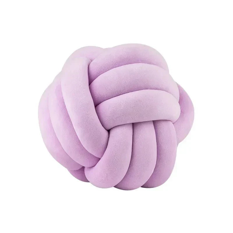 Decorative, soft cushion with knotted ball in suede look