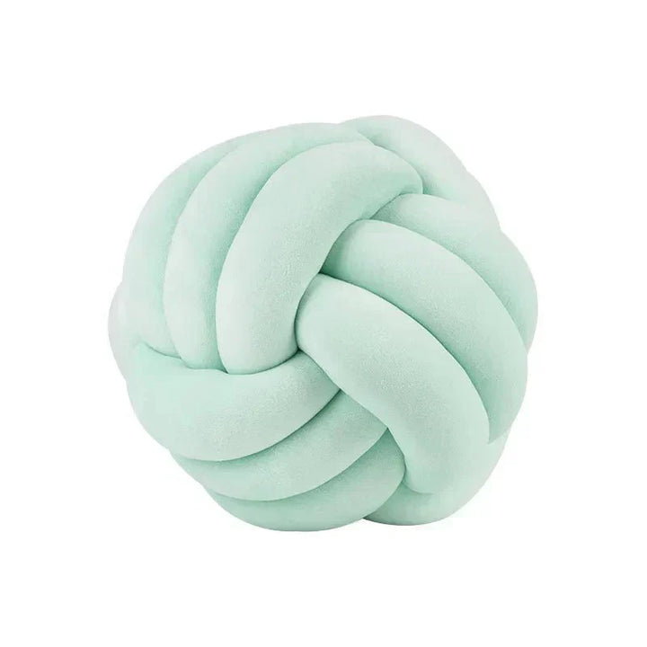 Decorative, soft cushion with knotted ball in suede look