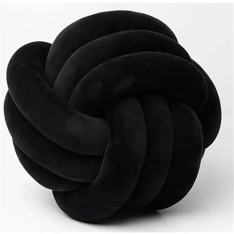 Decorative, soft cushion with knotted ball in suede look