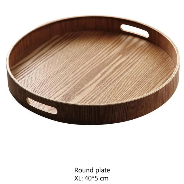 Slim, round serving trays made of wood