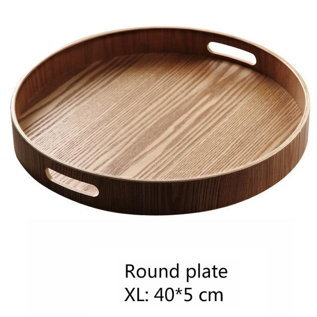 Slim, round serving trays made of wood
